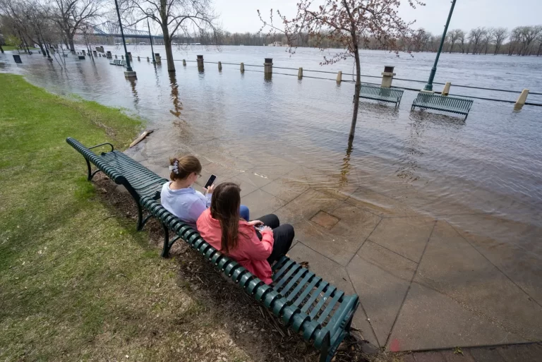 river breaking through banks